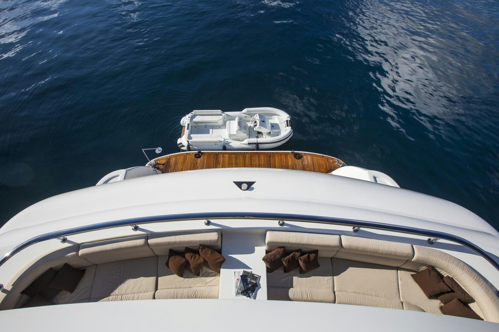 a boat with a white boat on it aboard DYNASTY Yacht for Sale