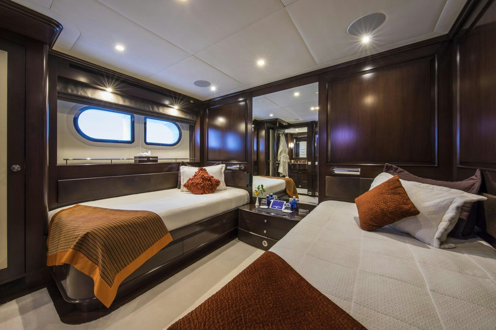 a room with two beds aboard DYNASTY Yacht for Sale