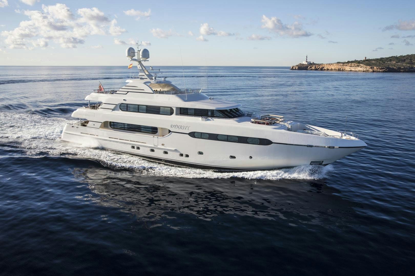 a white yacht in the water aboard DYNASTY Yacht for Sale