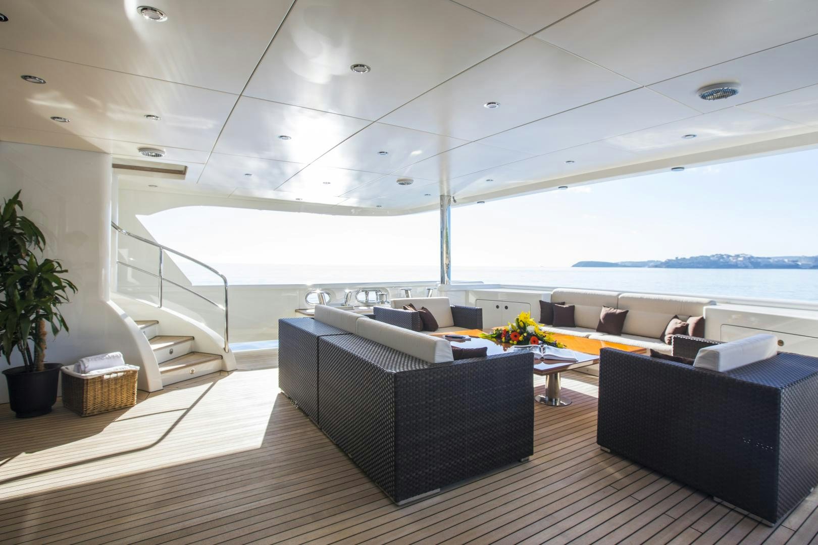 a living room with a large window aboard DYNASTY Yacht for Sale