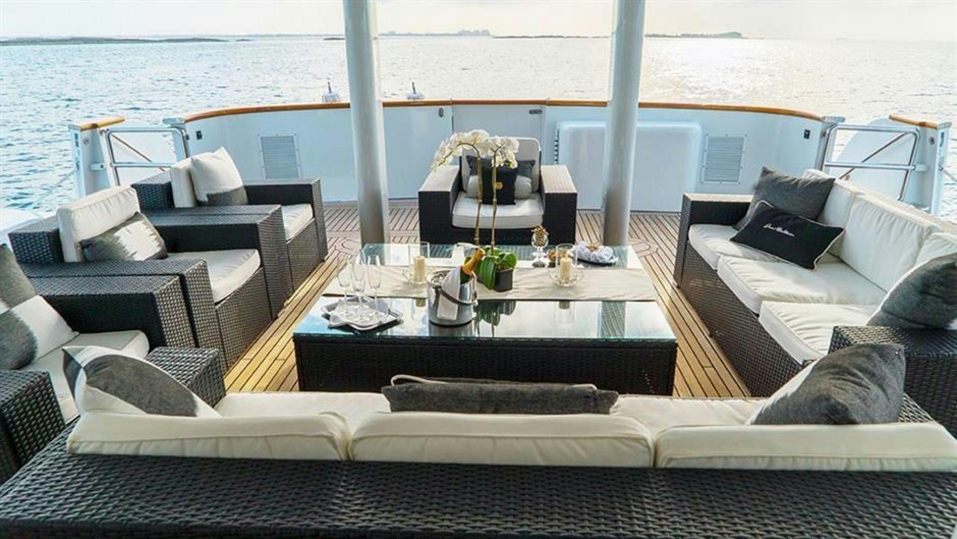 a table on a boat aboard GRAND ILLUSION Yacht for Sale
