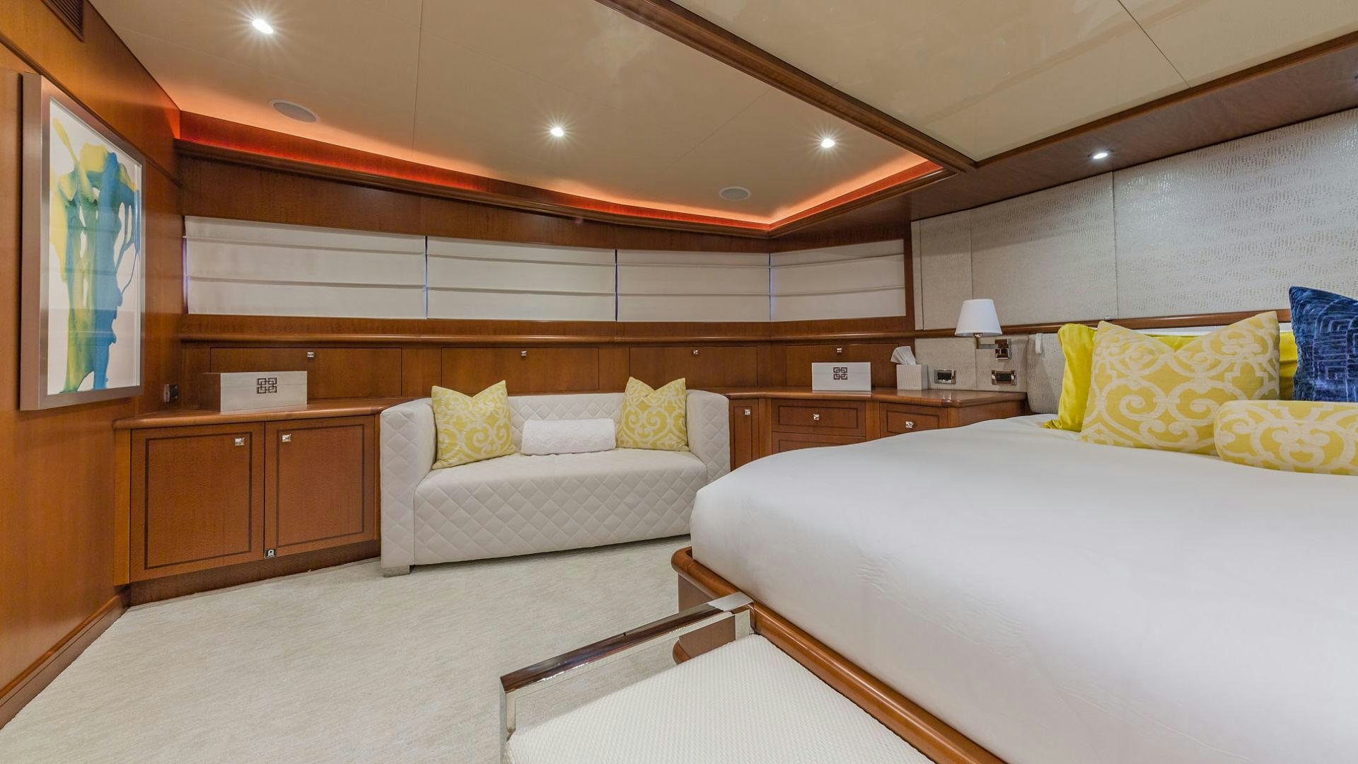 a room with two beds aboard AT LAST Yacht for Sale