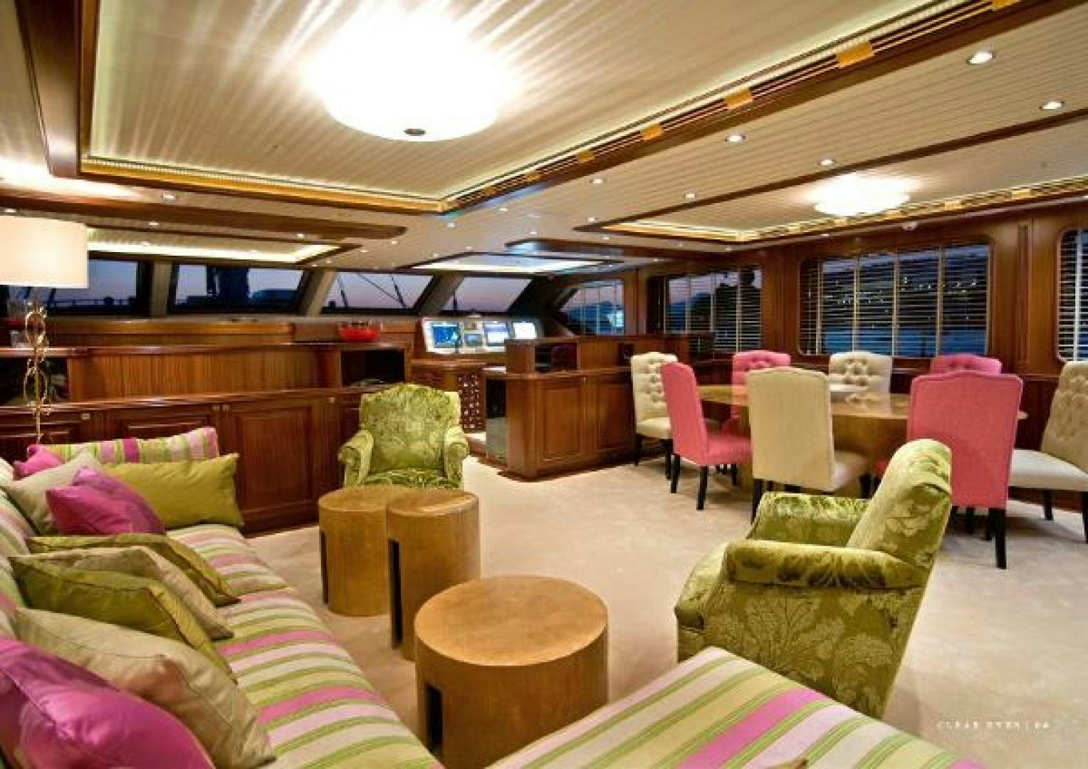a room with a couch and chairs aboard CLEAR EYES Yacht for Sale
