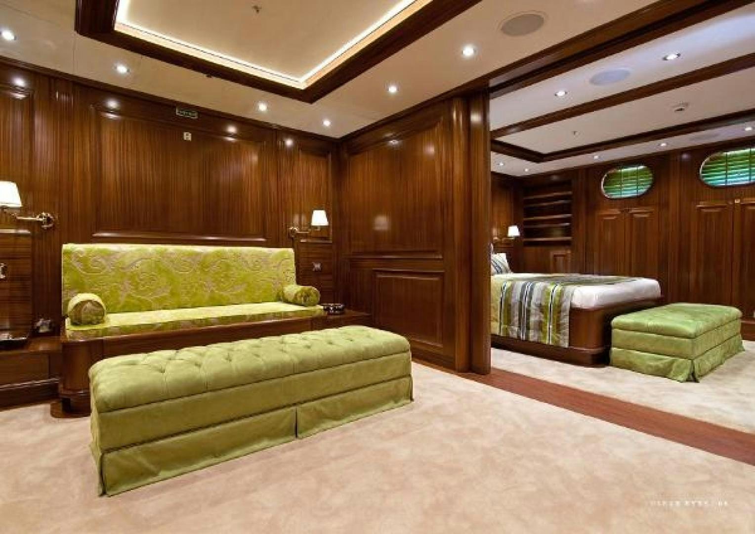 a room with a couch and a bed with Robie House in the background aboard CLEAR EYES Yacht for Sale
