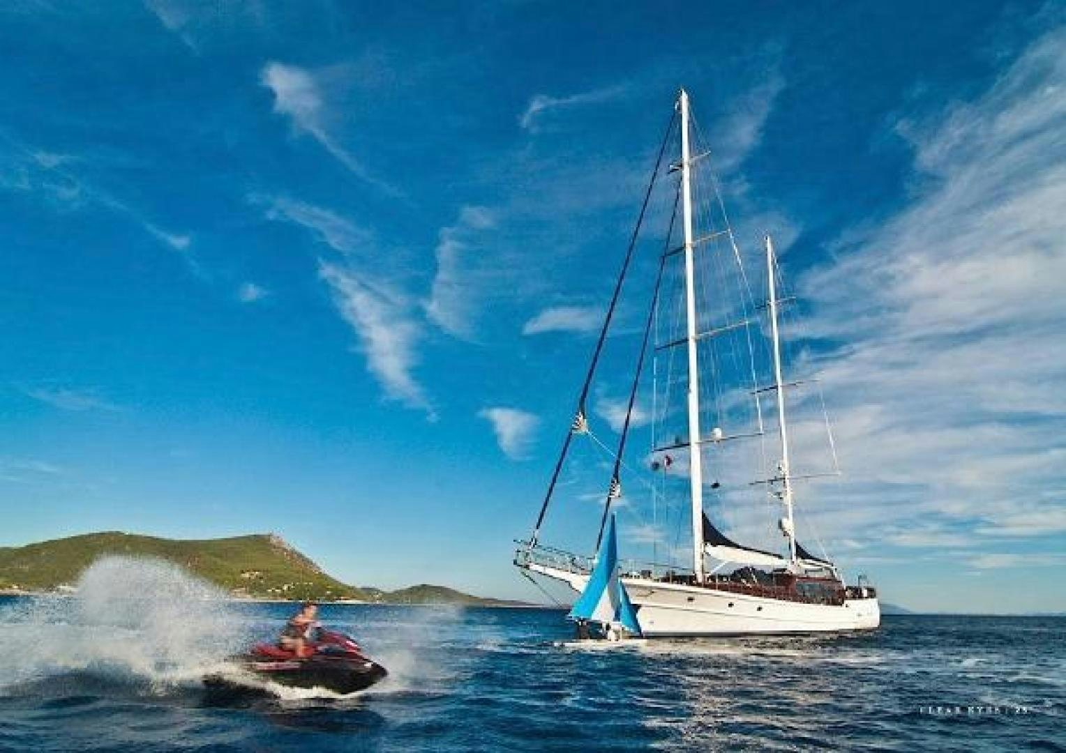 a boat with a person in it aboard CLEAR EYES Yacht for Sale