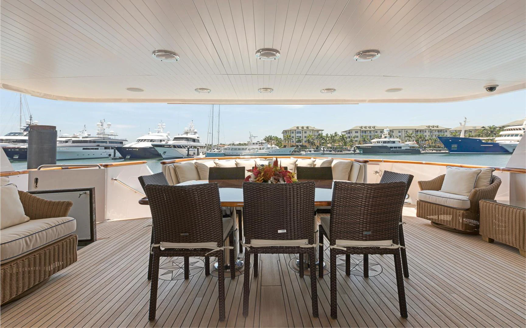 a table and chairs on a deck aboard TRUE NORTH Yacht for Sale