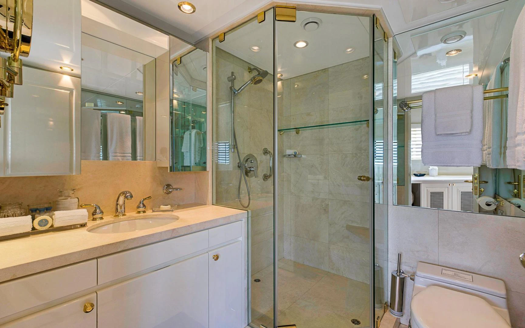 a bathroom with a shower unit and sink aboard TRUE NORTH Yacht for Sale