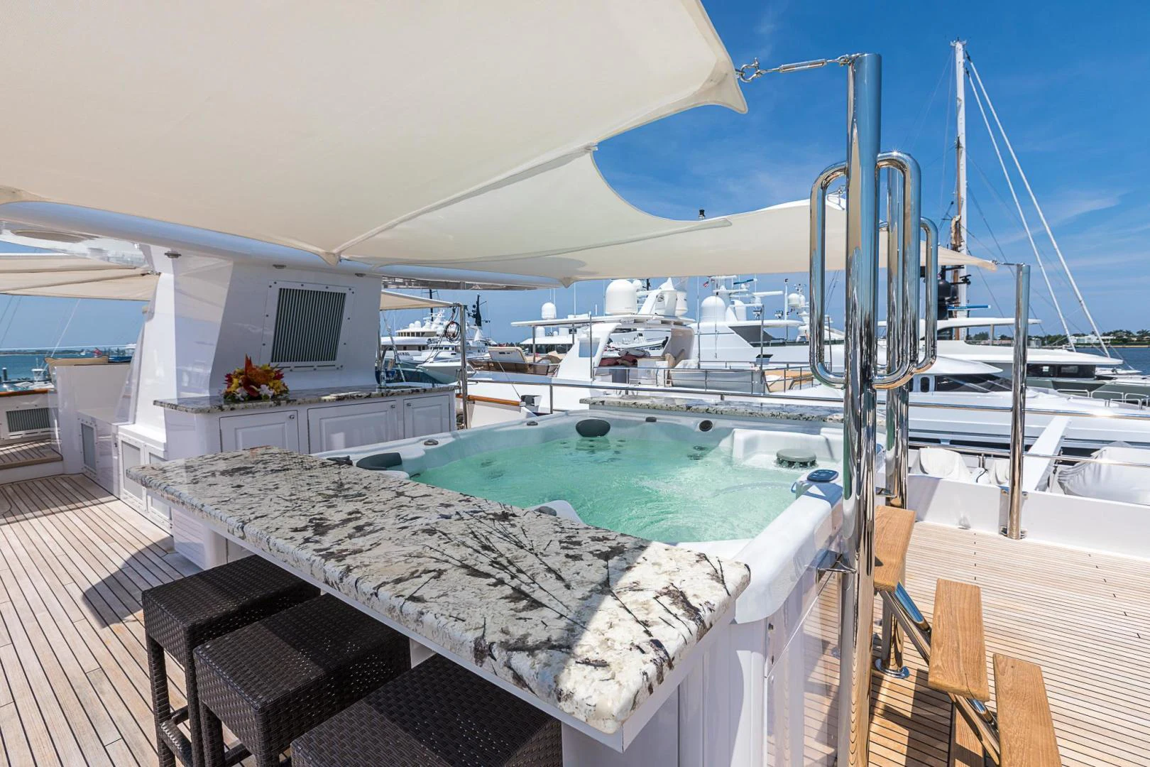 a large pool on a deck aboard TRUE NORTH Yacht for Sale