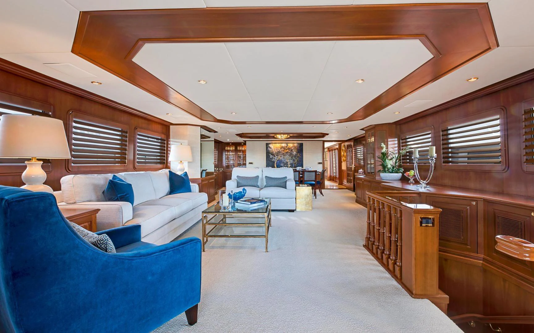 a living room with a couch and a table aboard TRUE NORTH Yacht for Sale
