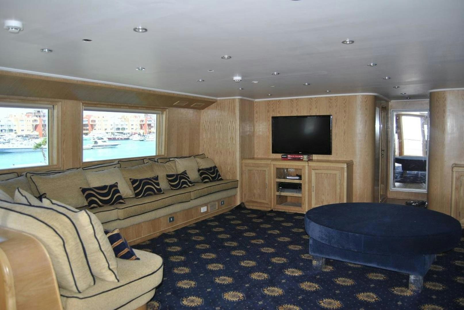 a living room with a couch and a tv aboard NO NAME Yacht for Sale