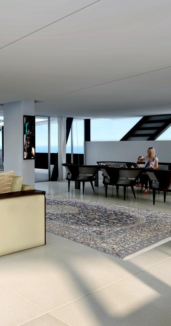 a room with a table and chairs aboard SEA VOYAGER 143 Yacht for Sale