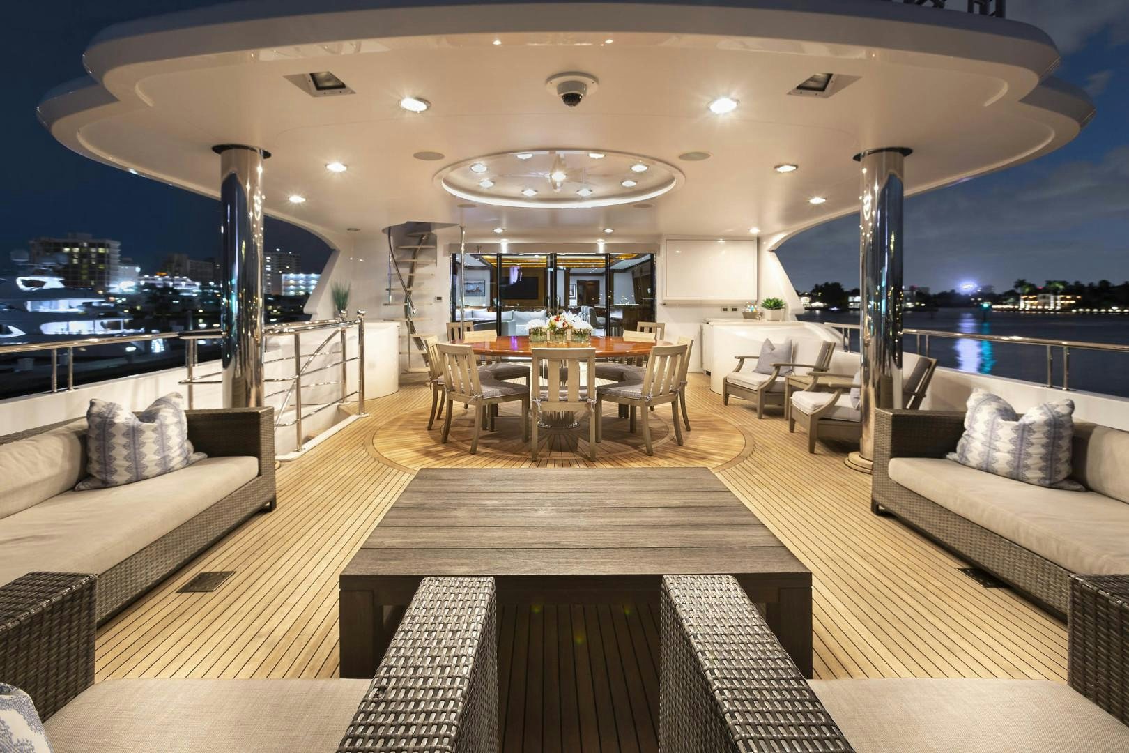 a living room with a large window aboard FAR FROM IT Yacht for Charter