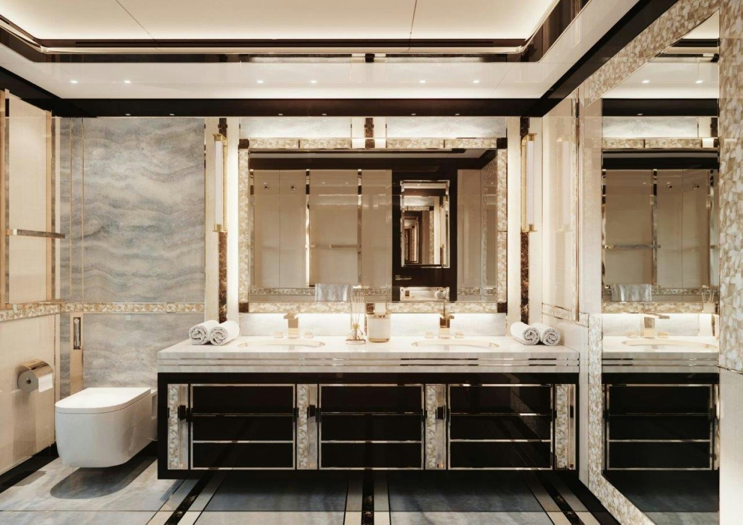 a bathroom with a large mirror aboard GTT 140 Yacht for Sale