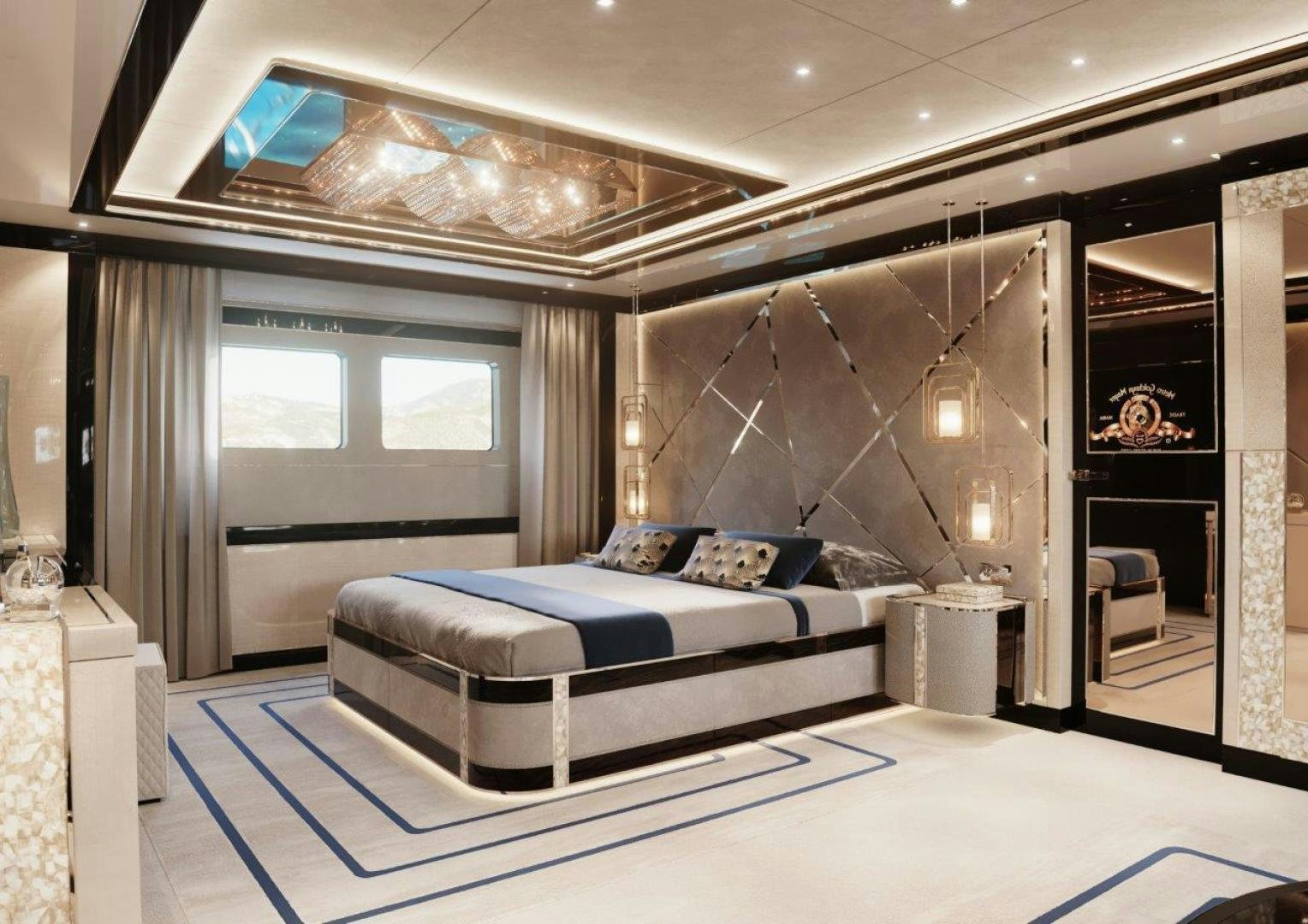 a large room with a couch aboard GTT 140 Yacht for Sale