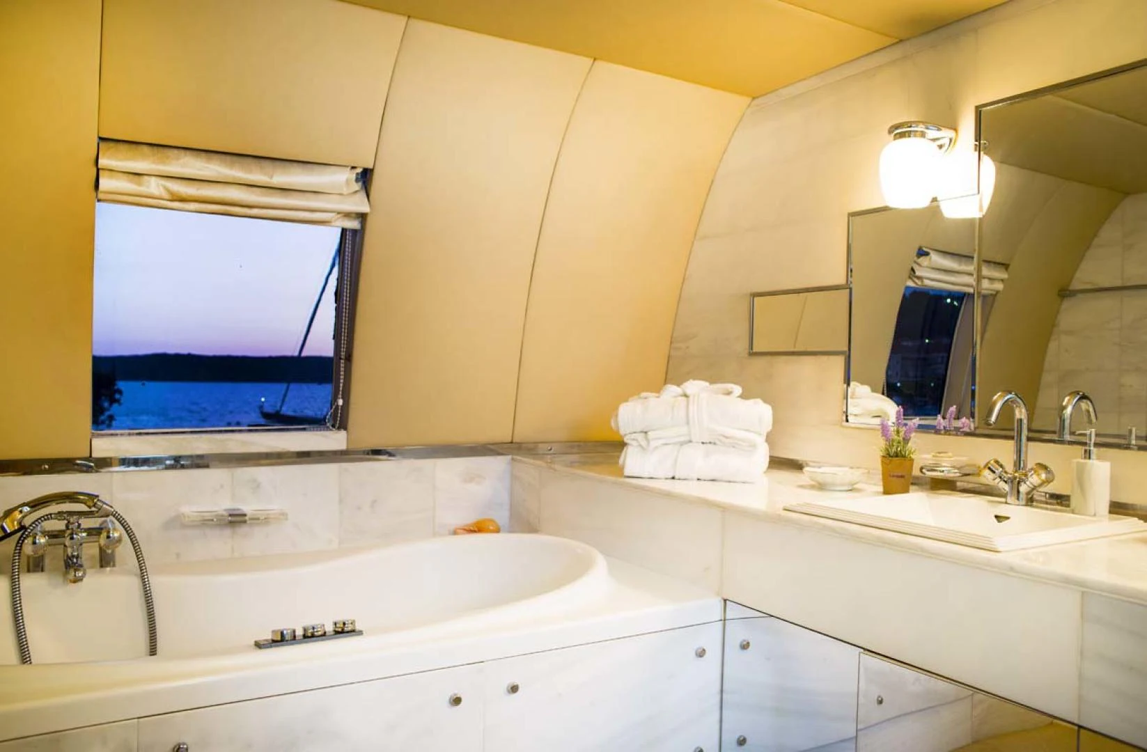 a bathroom with white sinks aboard GELLY Yacht for Sale