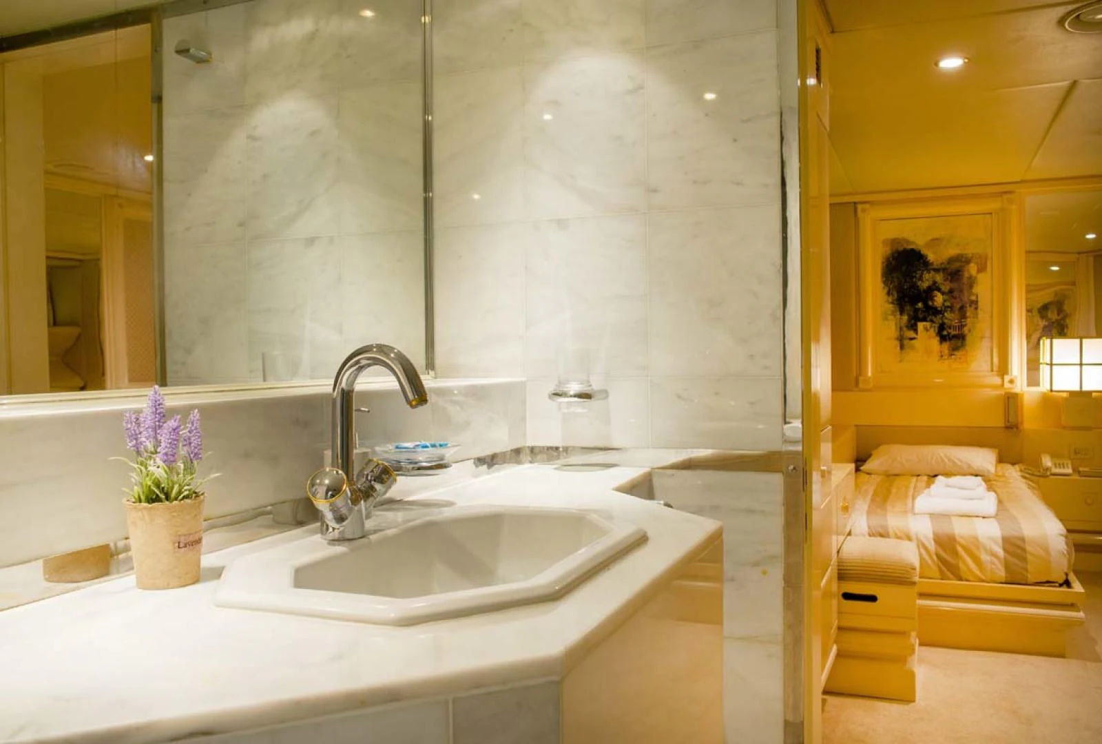 a bathroom with a large mirror aboard GELLY Yacht for Sale
