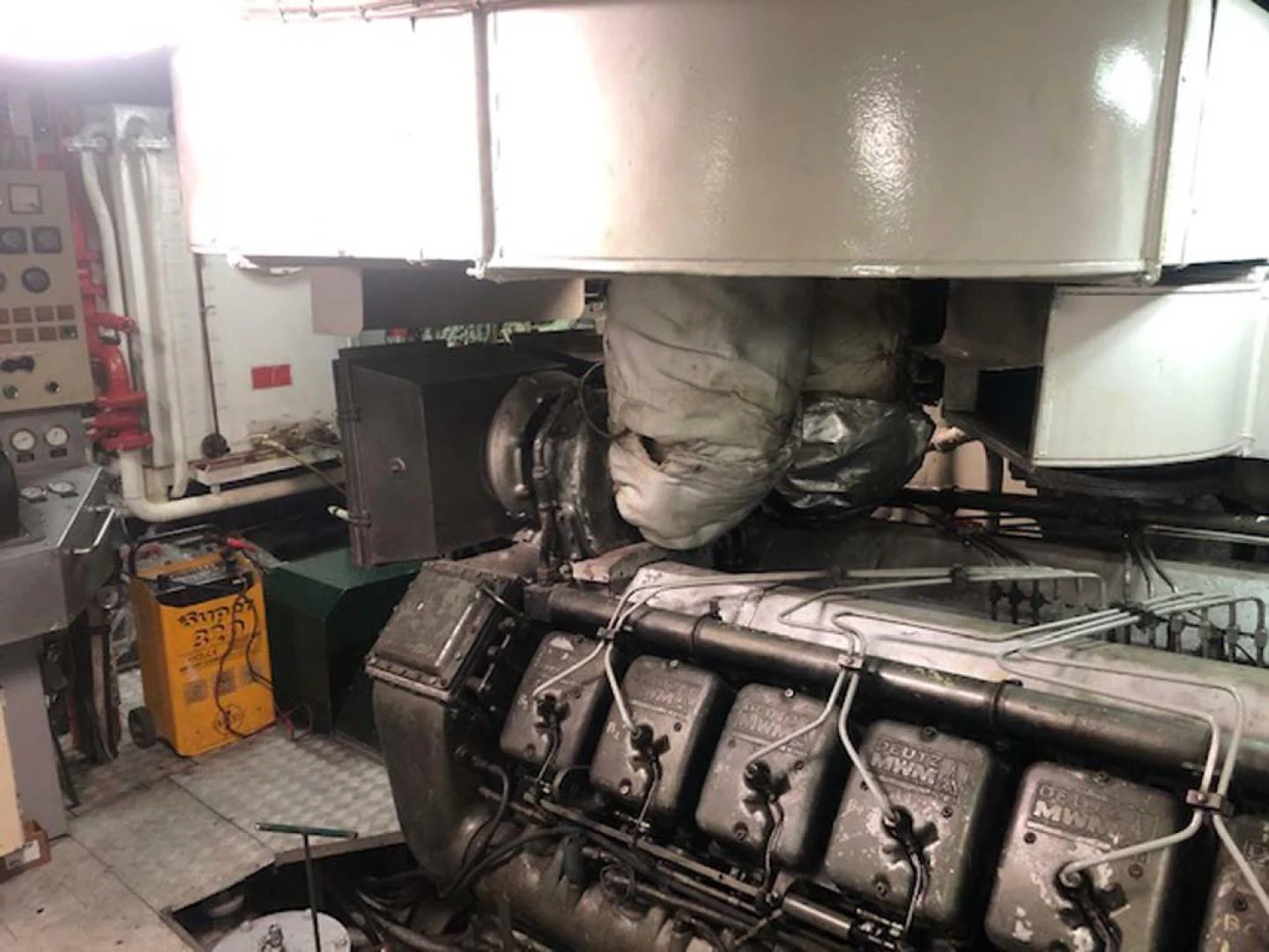 a large machine with a large piece of equipment in it aboard GELLY Yacht for Sale