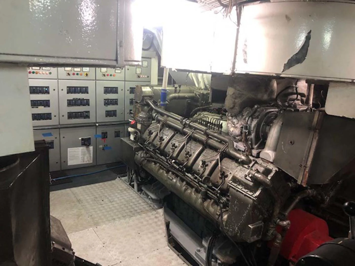a large machine in a room aboard GELLY Yacht for Sale