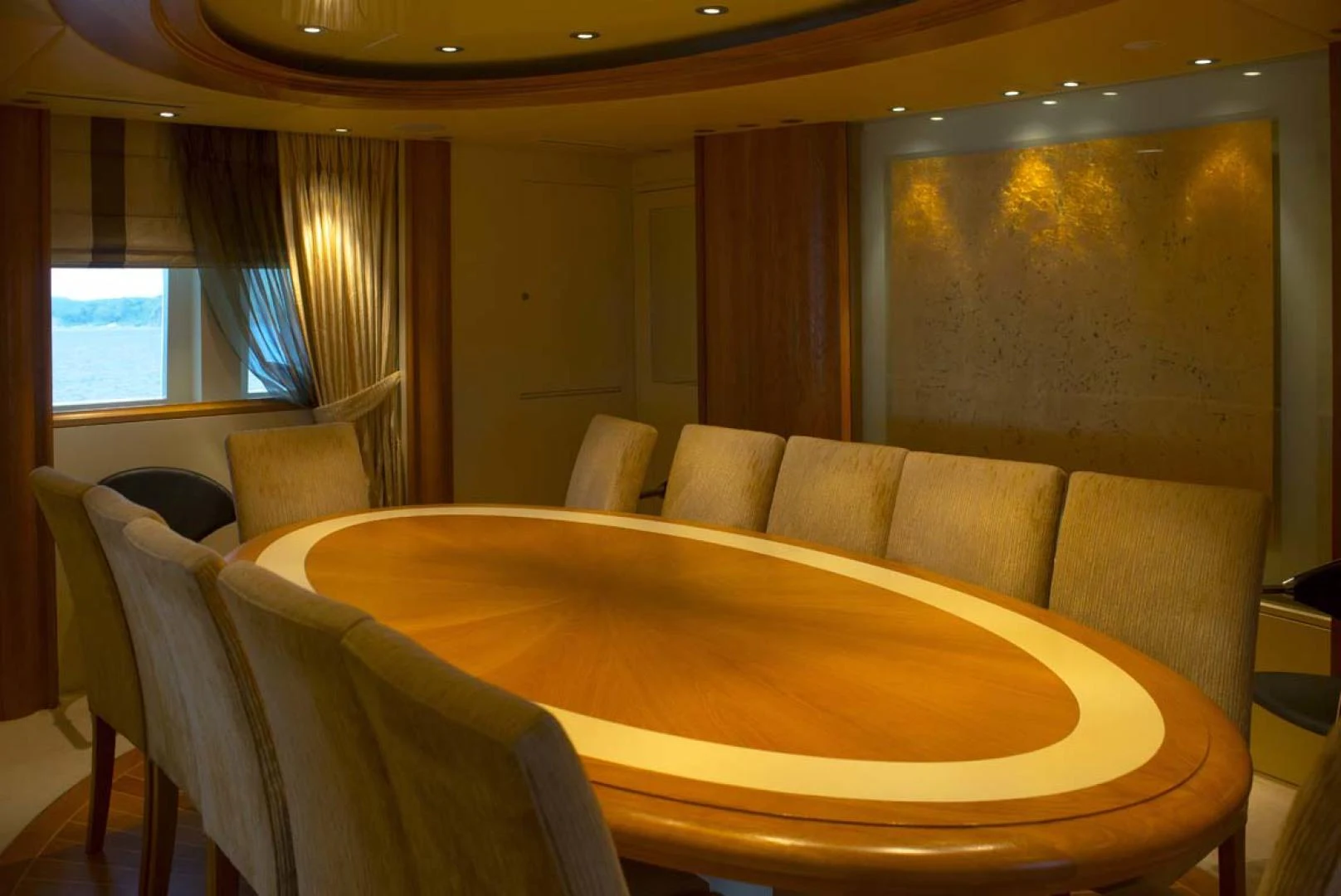 a living room with couches aboard GELLY Yacht for Sale