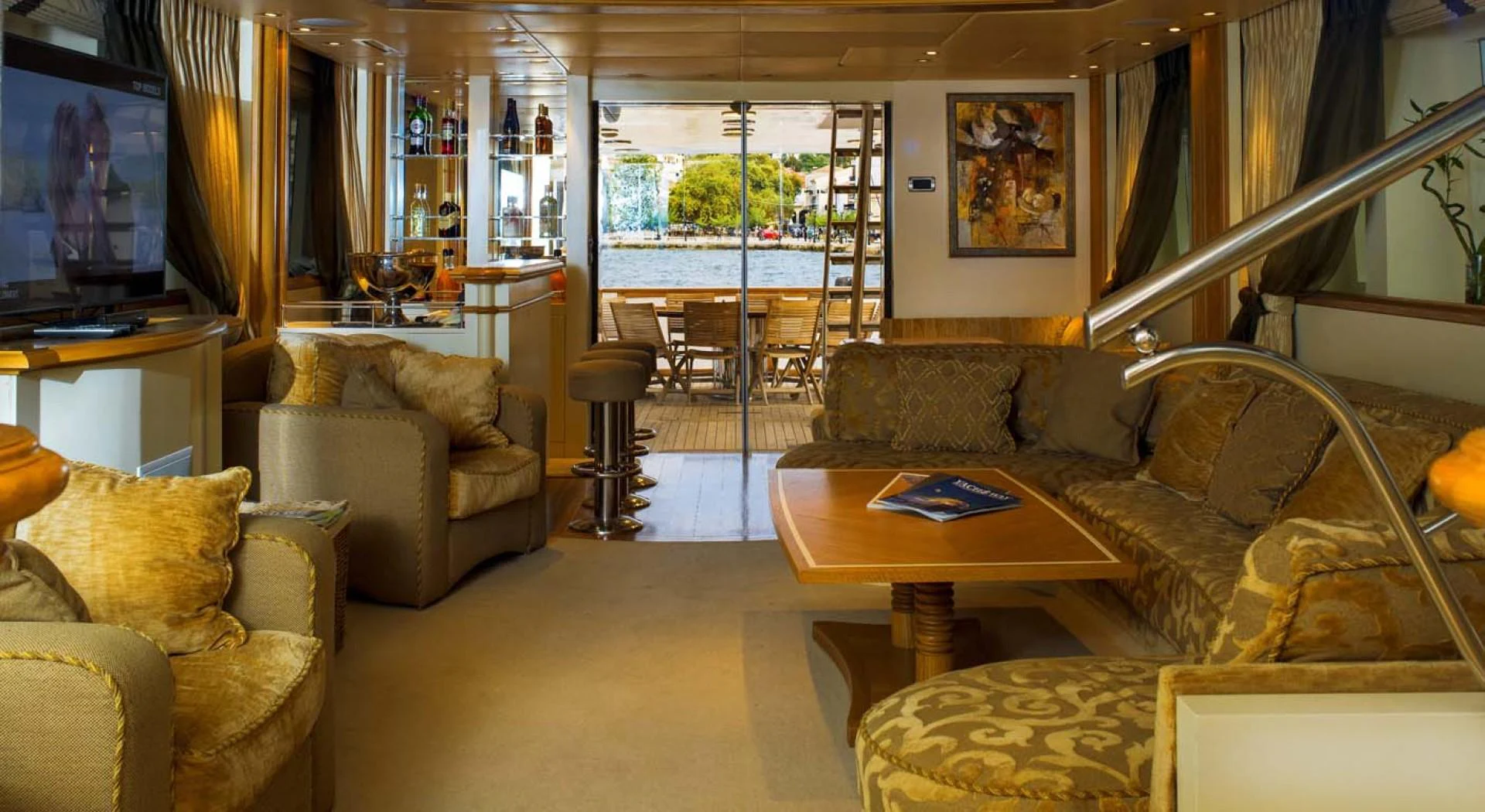 a living room with a fireplace aboard GELLY Yacht for Sale
