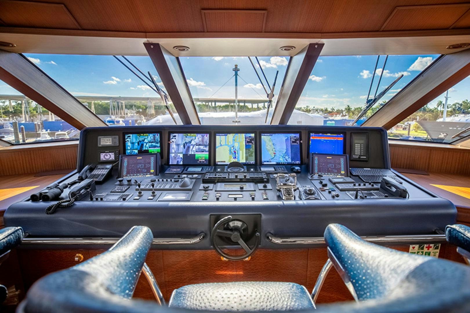 inside of a vehicle with many monitors aboard NEVER ENOUGH Yacht for Charter