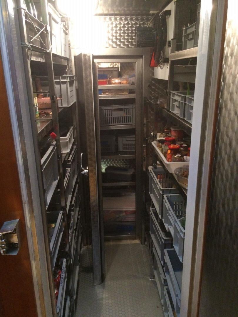 a room with shelves and a shelf aboard DELUSHA Yacht for Sale