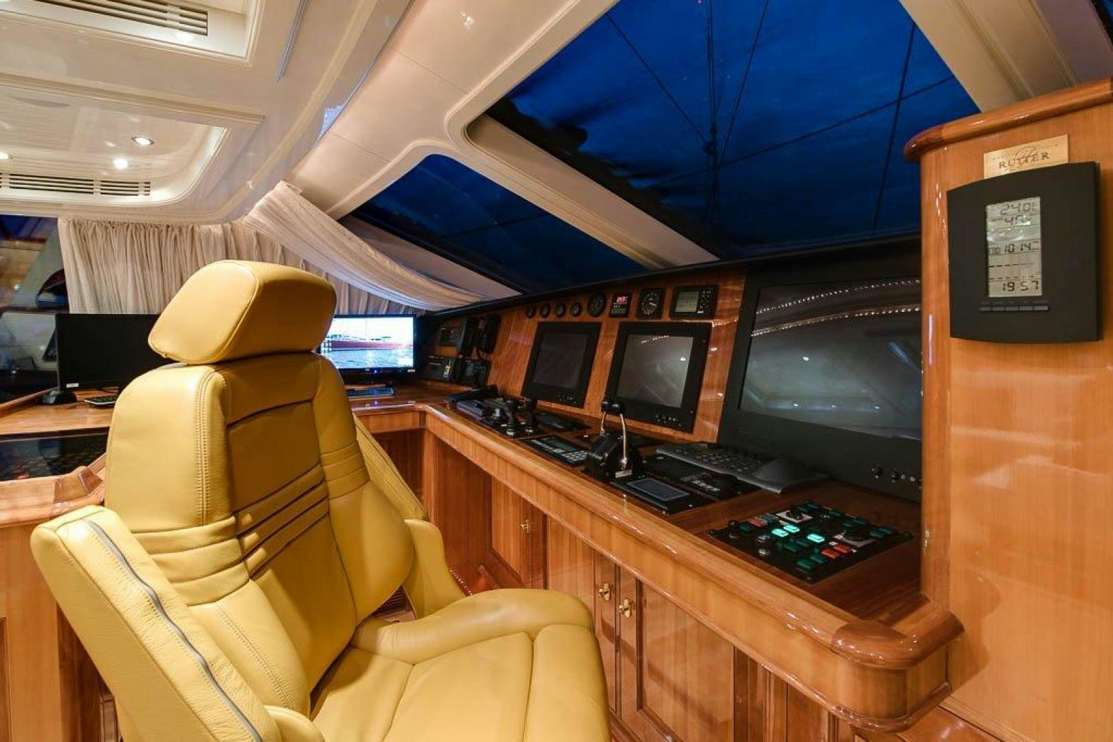 a room with a desk and computer aboard DELUSHA Yacht for Sale