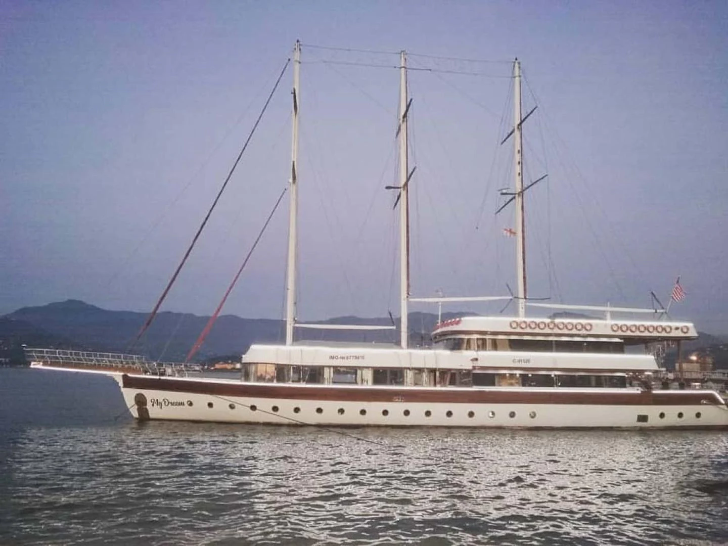 a large white boat on the water aboard MY DREAM Yacht for Sale