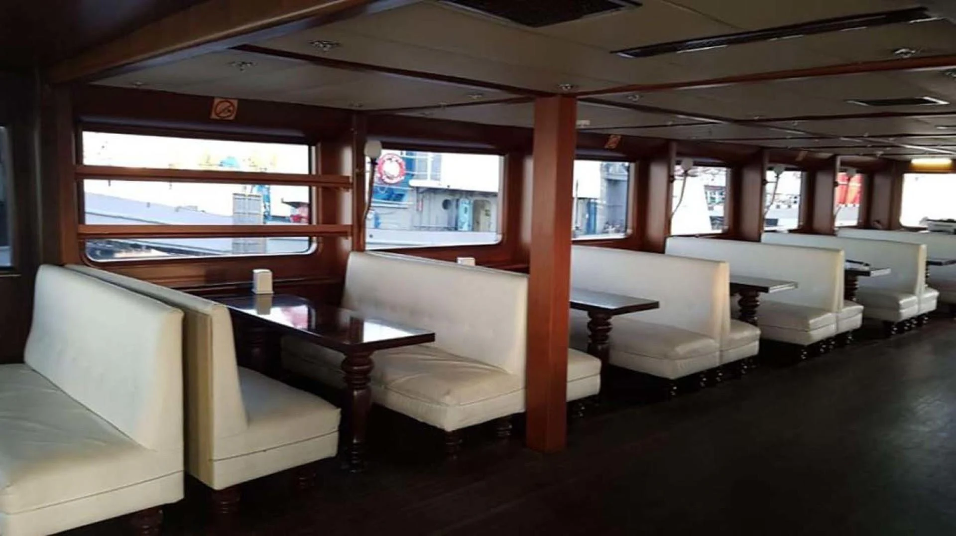 a room with a table and chairs aboard MY DREAM Yacht for Sale