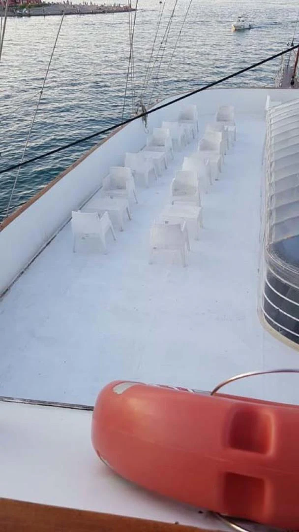 a red object on a white surface aboard MY DREAM Yacht for Sale