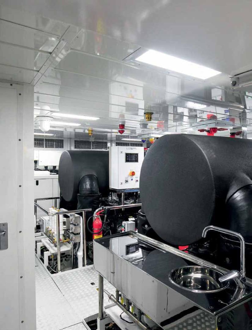 a room with a chair and a table aboard DREW Yacht for Sale