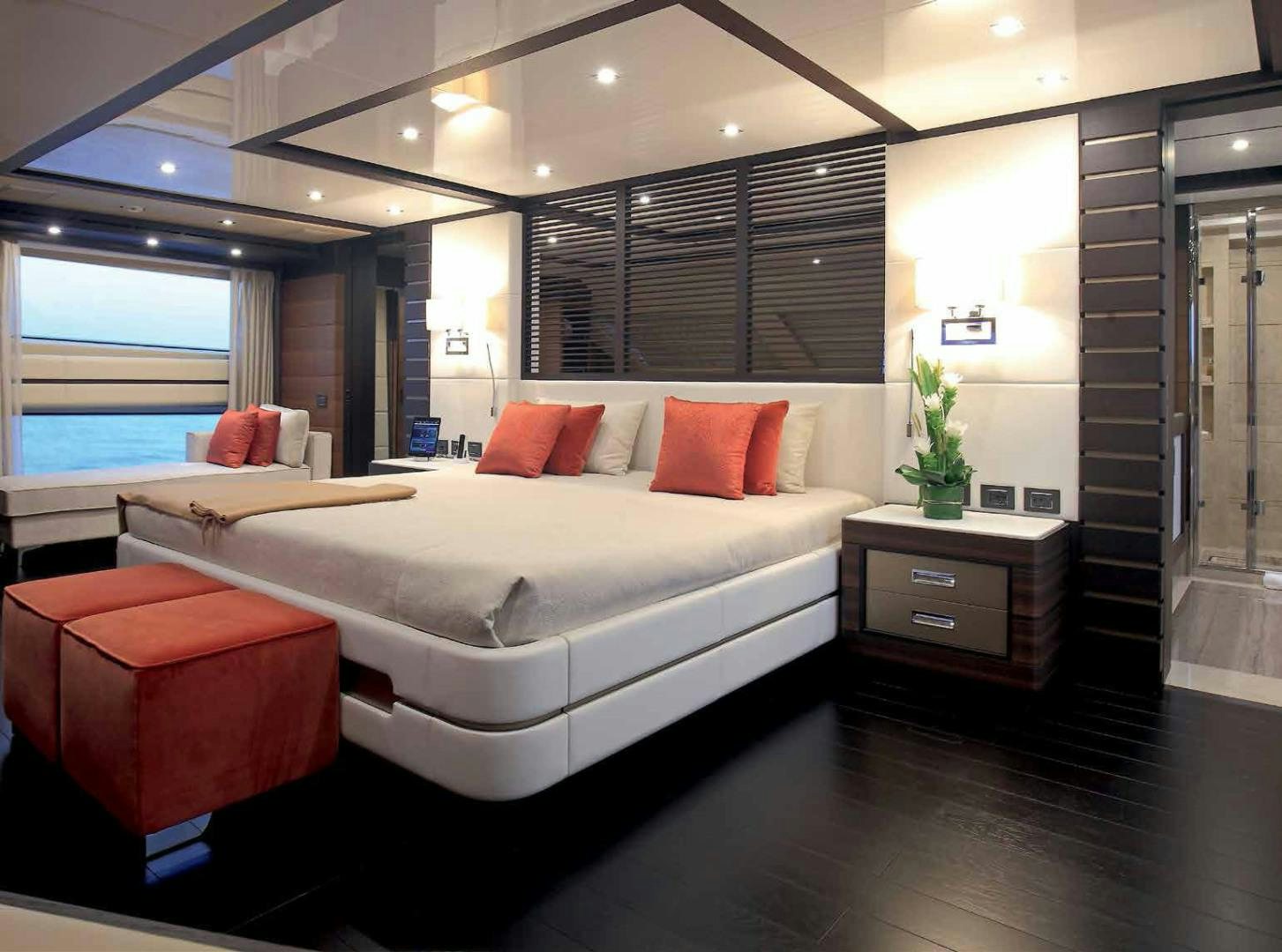 a large bed in a room aboard DREW Yacht for Sale