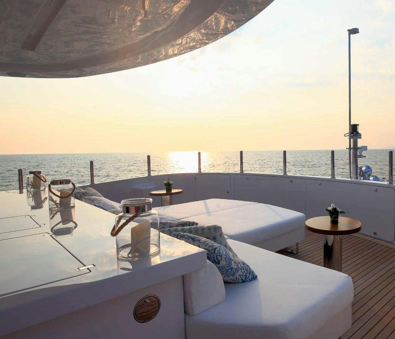 a large bathtub with a large body of water in the background aboard DREW Yacht for Sale