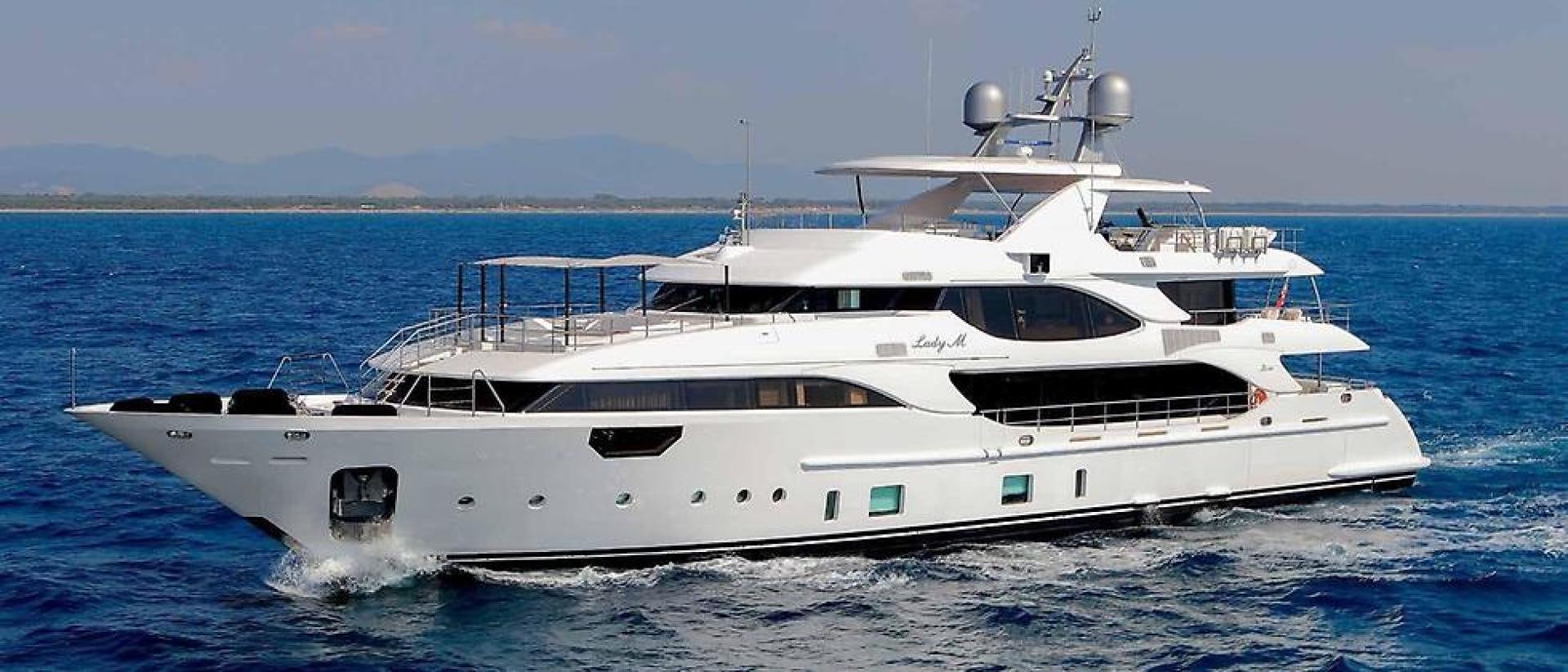 a white yacht on the water aboard DREW Yacht for Sale