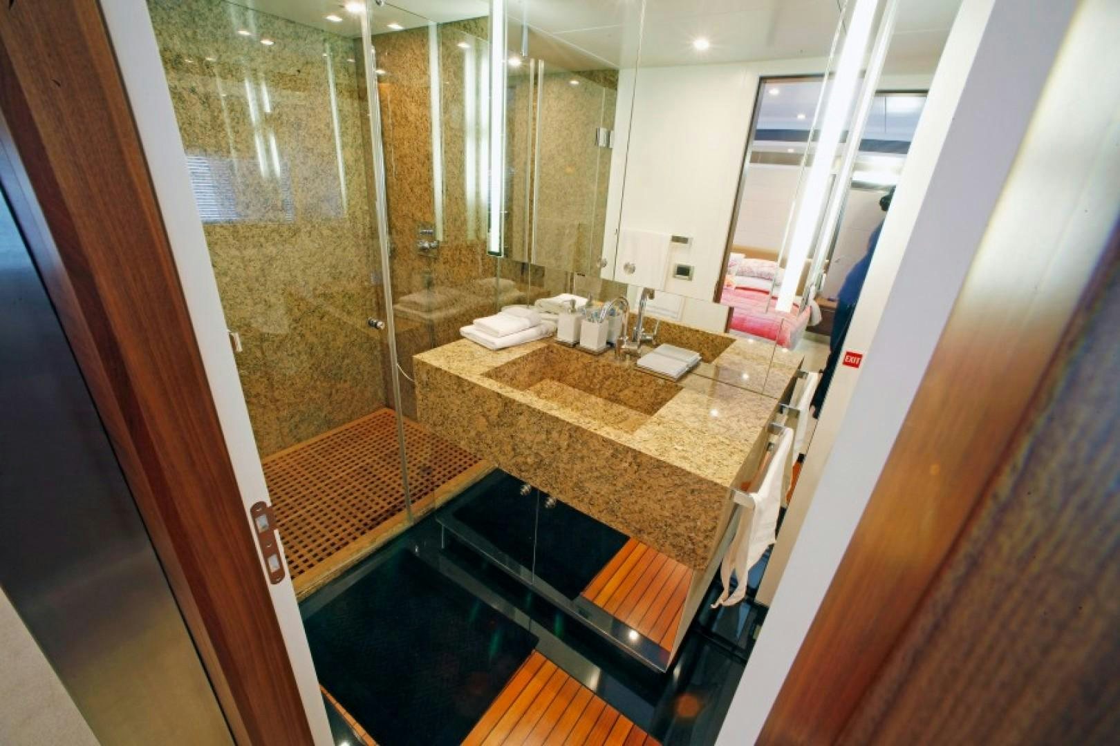 a bathroom with a large mirror aboard MR MOUSE Yacht for Sale