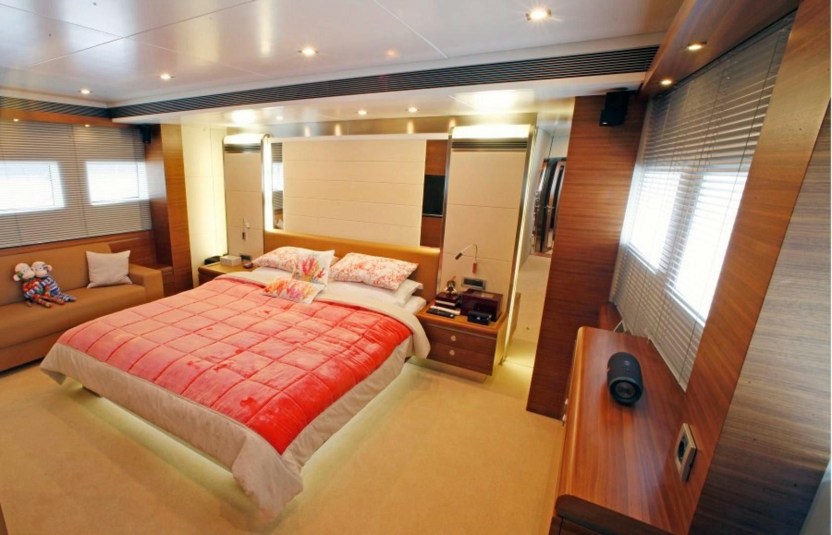 a room with a bed and a window aboard MR MOUSE Yacht for Sale