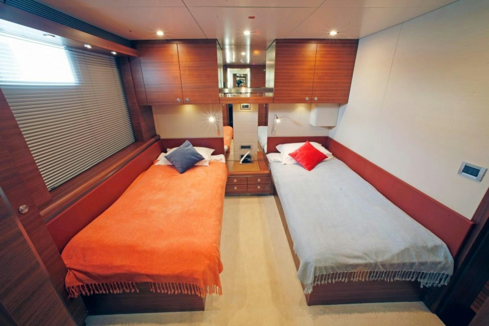 a room with a bed and a desk aboard MR MOUSE Yacht for Sale