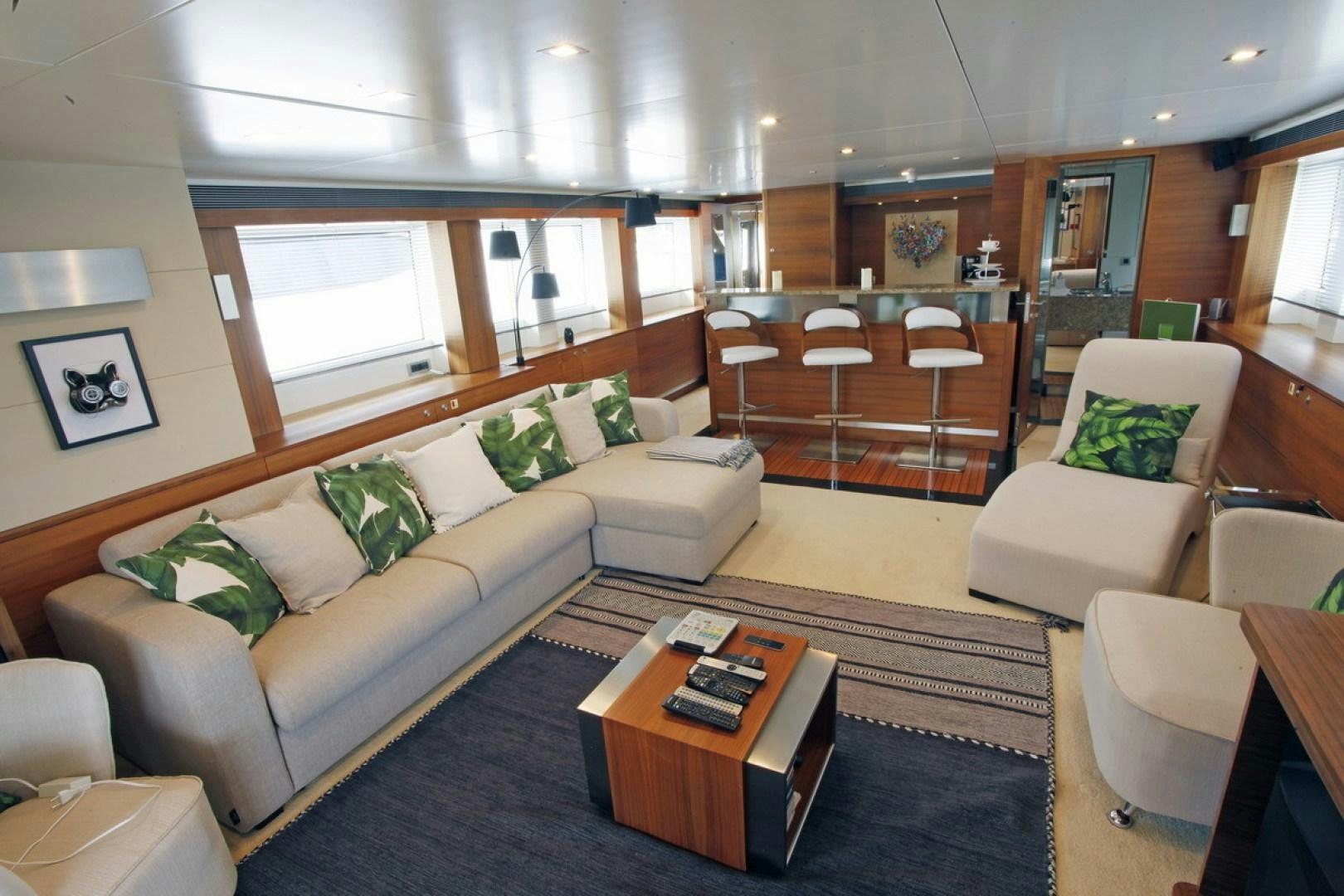 a living room with a couch and a coffee table aboard MR MOUSE Yacht for Sale