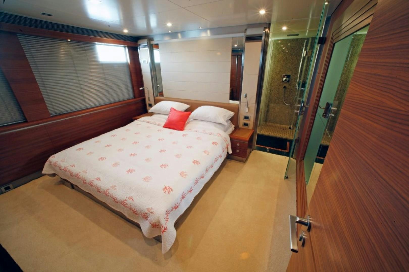 a bed in a room aboard MR MOUSE Yacht for Sale