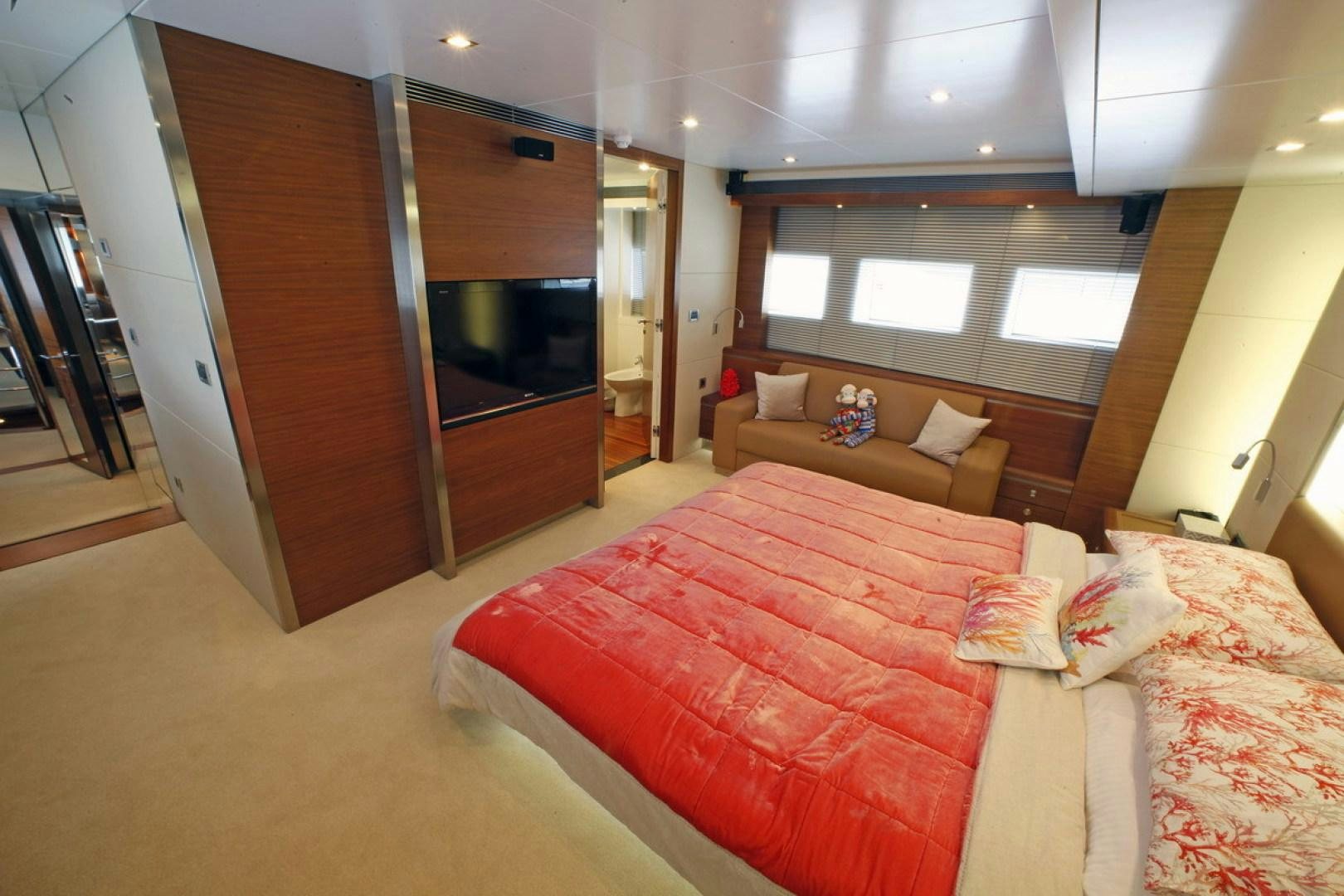 a room with a bed and a couch aboard MR MOUSE Yacht for Sale
