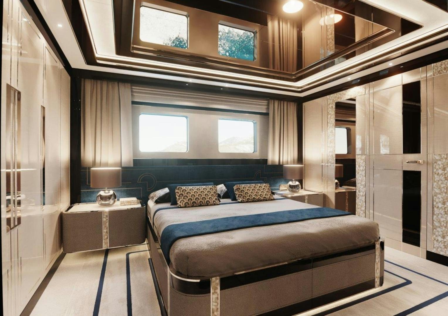 a large bedroom with a bed aboard GTT 135 Yacht for Sale