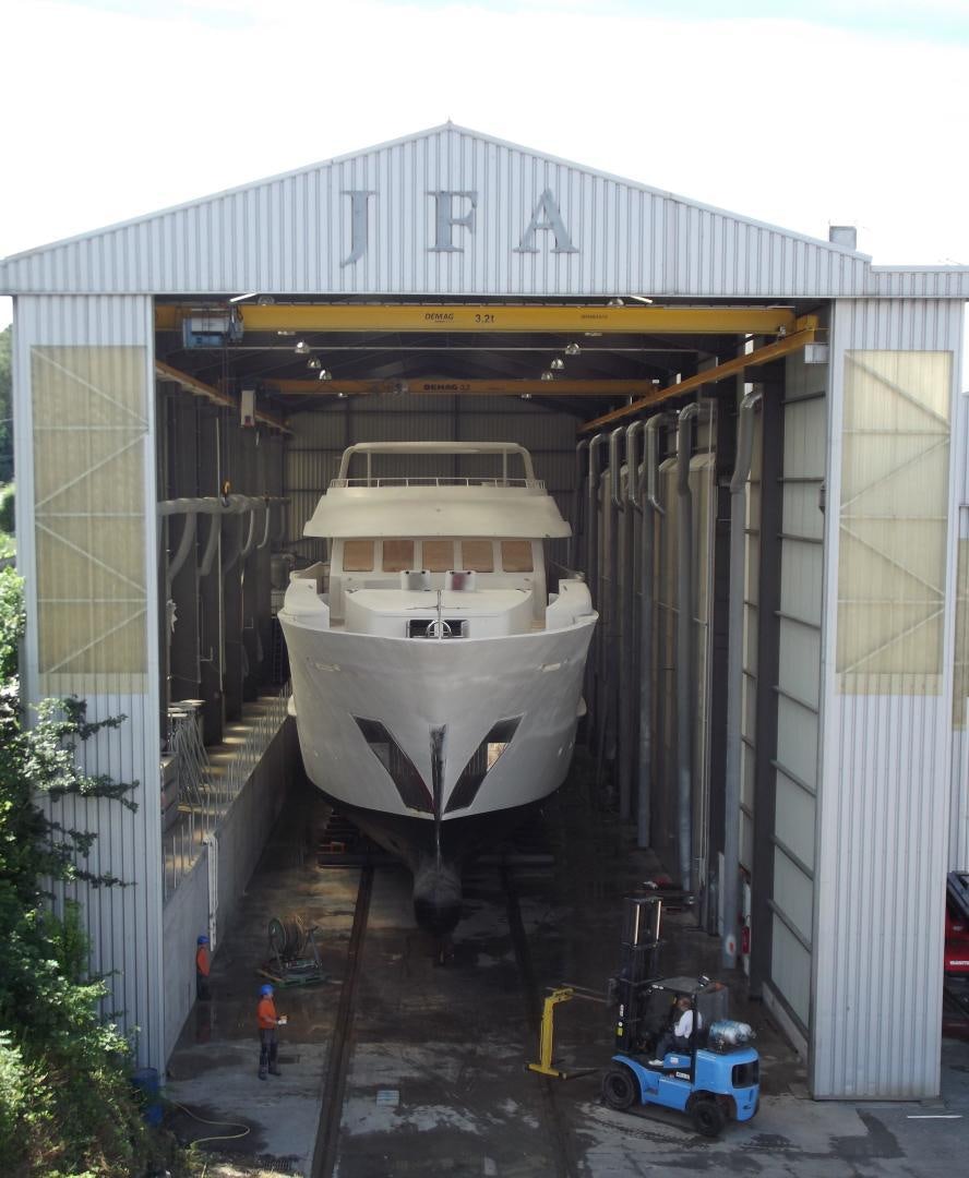 a large white machine outside a building aboard MAGELLAN Yacht for Sale