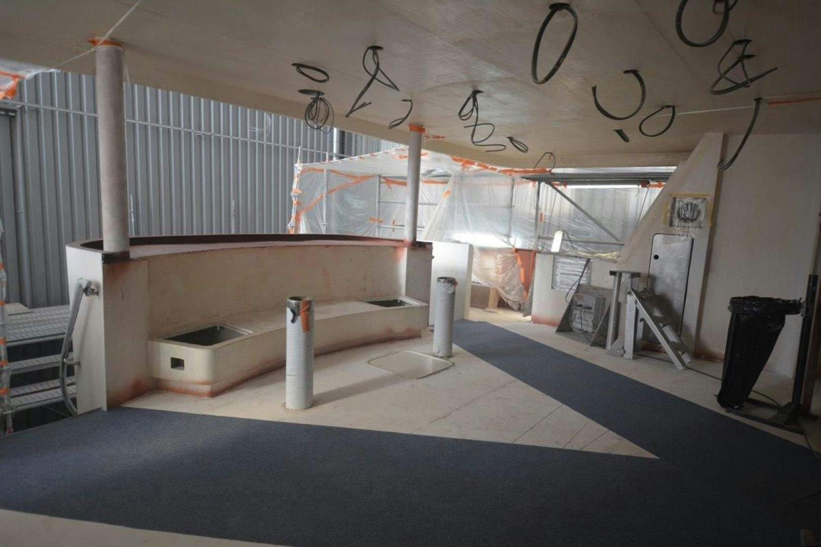 a room with a large white machine aboard MAGELLAN Yacht for Sale