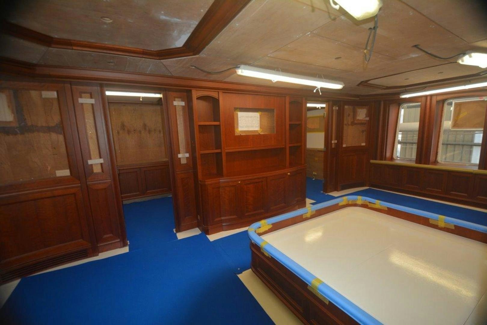 a swimming pool in a room aboard MAGELLAN Yacht for Sale