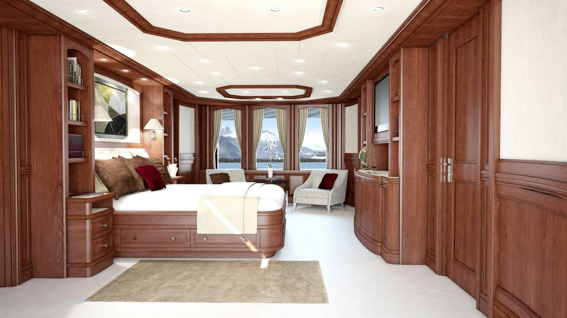 a room with a bed and a couch aboard MAGELLAN Yacht for Sale