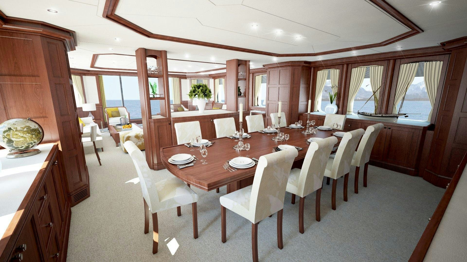 a dining table in a room aboard MAGELLAN Yacht for Sale