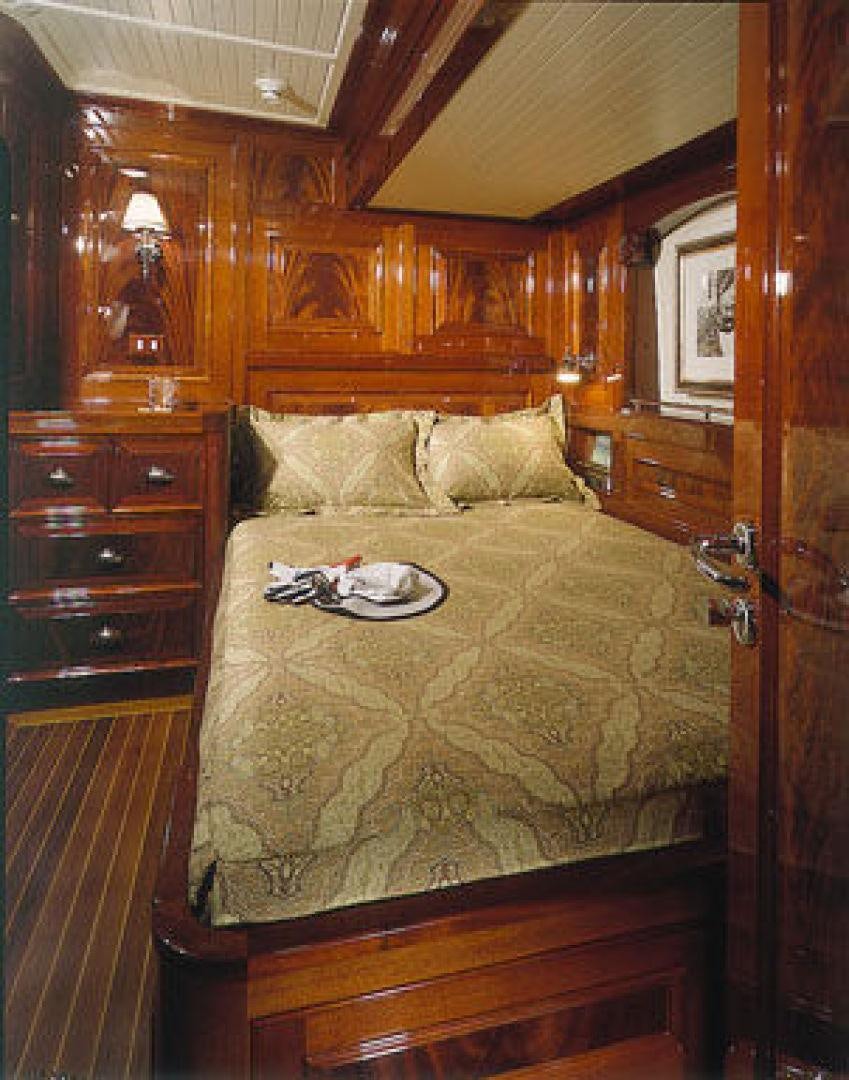 a bed with a comforter aboard RANGER Yacht for Sale