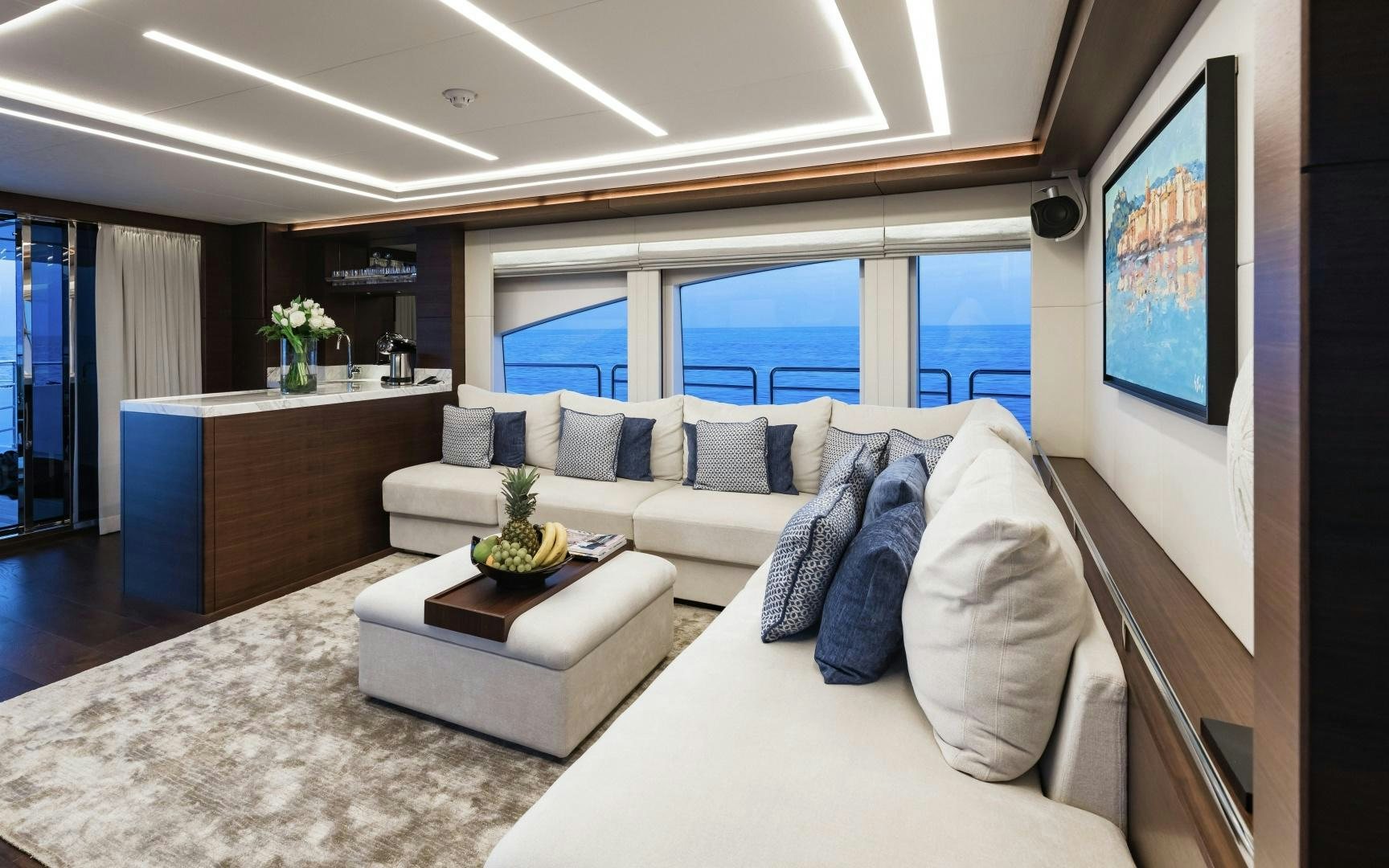 a living room with a large window aboard ALTAVITA Yacht for Sale