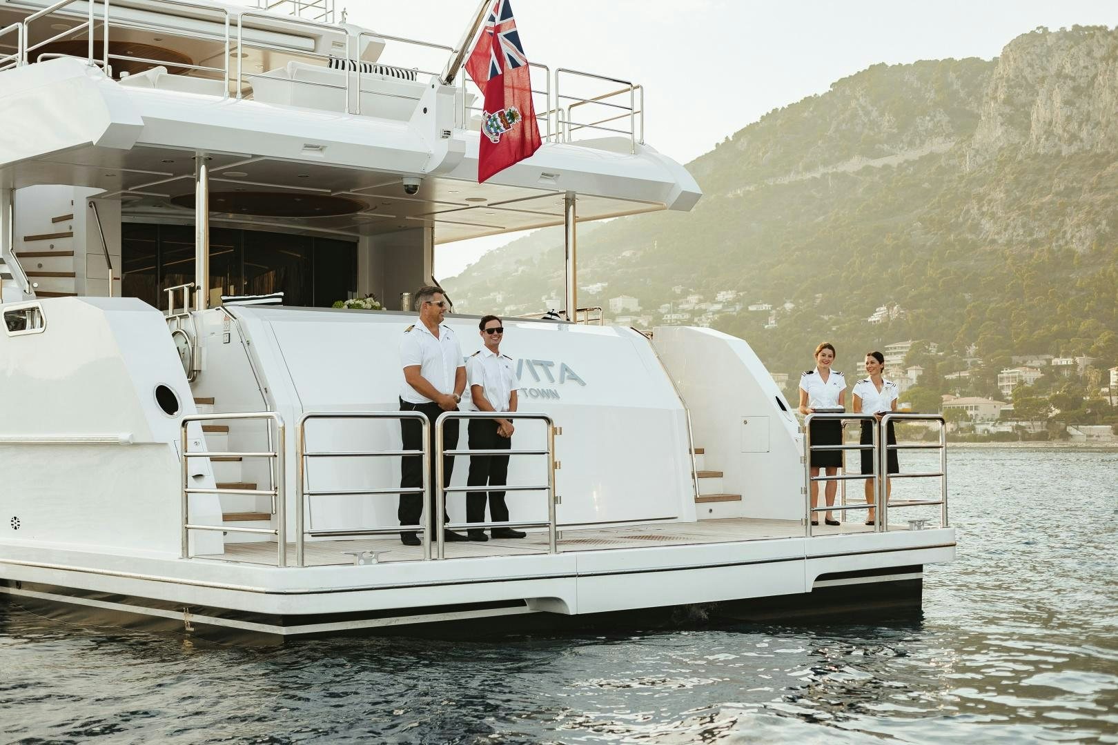 a group of people on a boat aboard ALTAVITA Yacht for Sale