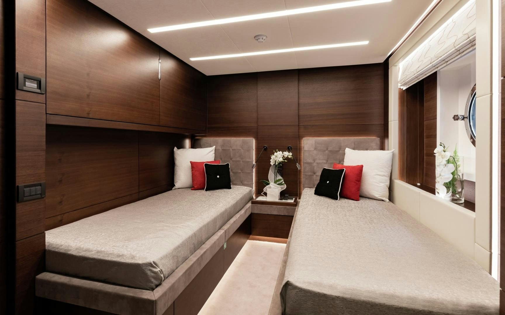 a room with a bed and a desk aboard ALTAVITA Yacht for Sale